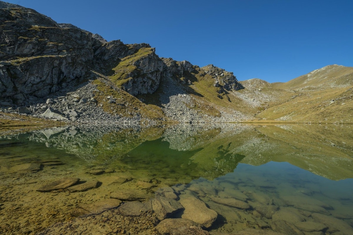 Geschichte: Gratwanderung zum Blausee und Piz Titschal